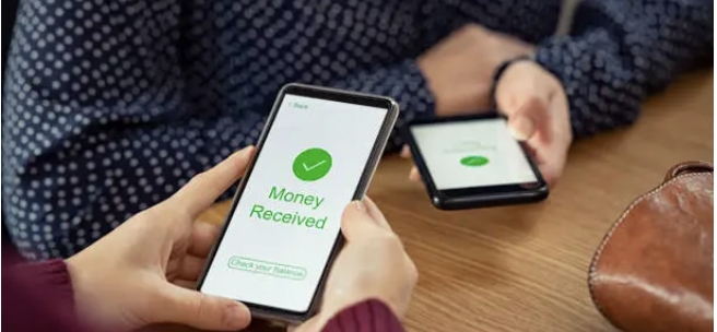 Money being sent through a personal payment app.